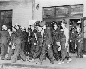 Denim-clad women welders en route to their job to help the war effort, circa 1943.  Photo: Stocktrek Images, Inc./Alamy Stock Photo.